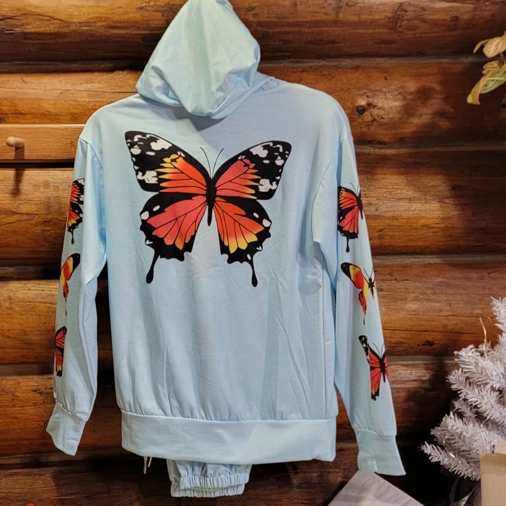 New Jogger outfit Orange/black butterflys on sky blue jacket/pants.